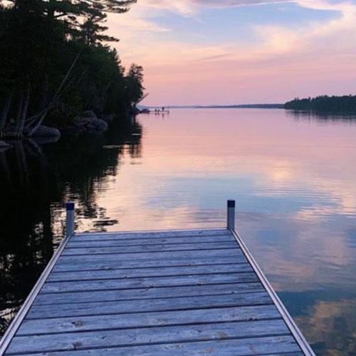 Photograph of sunset over a lake.